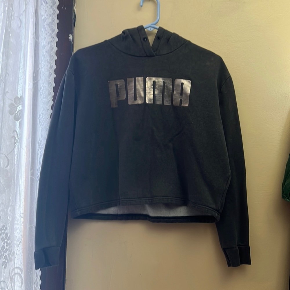 I am selling a Puma crop top sweat shirt.